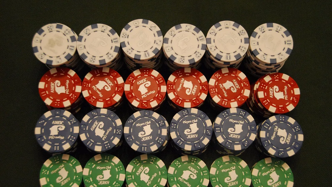 Casino chips stacked by colour